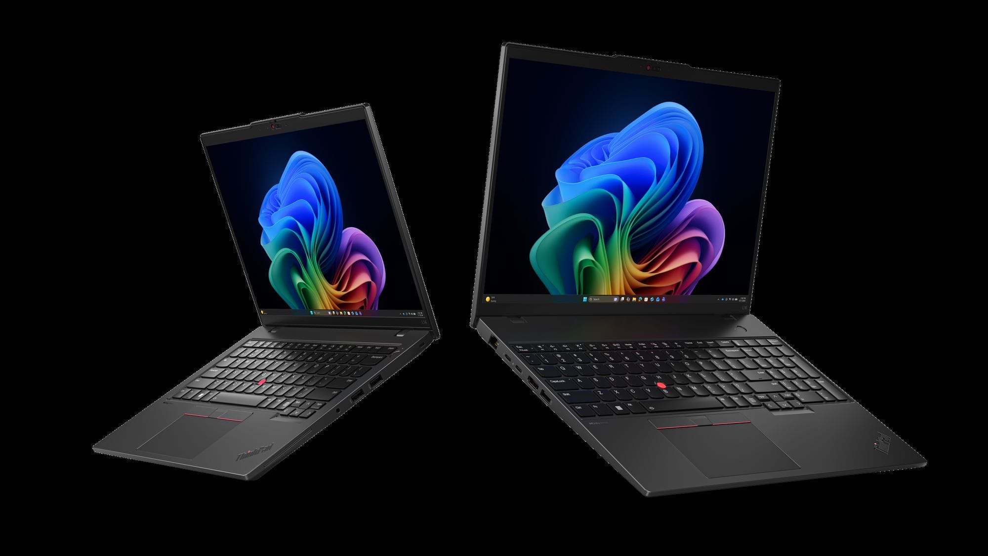 Two black Lenovo ThinkPad laptops open on a black background, displays showing colorful abstract wallpaper on both screens.
