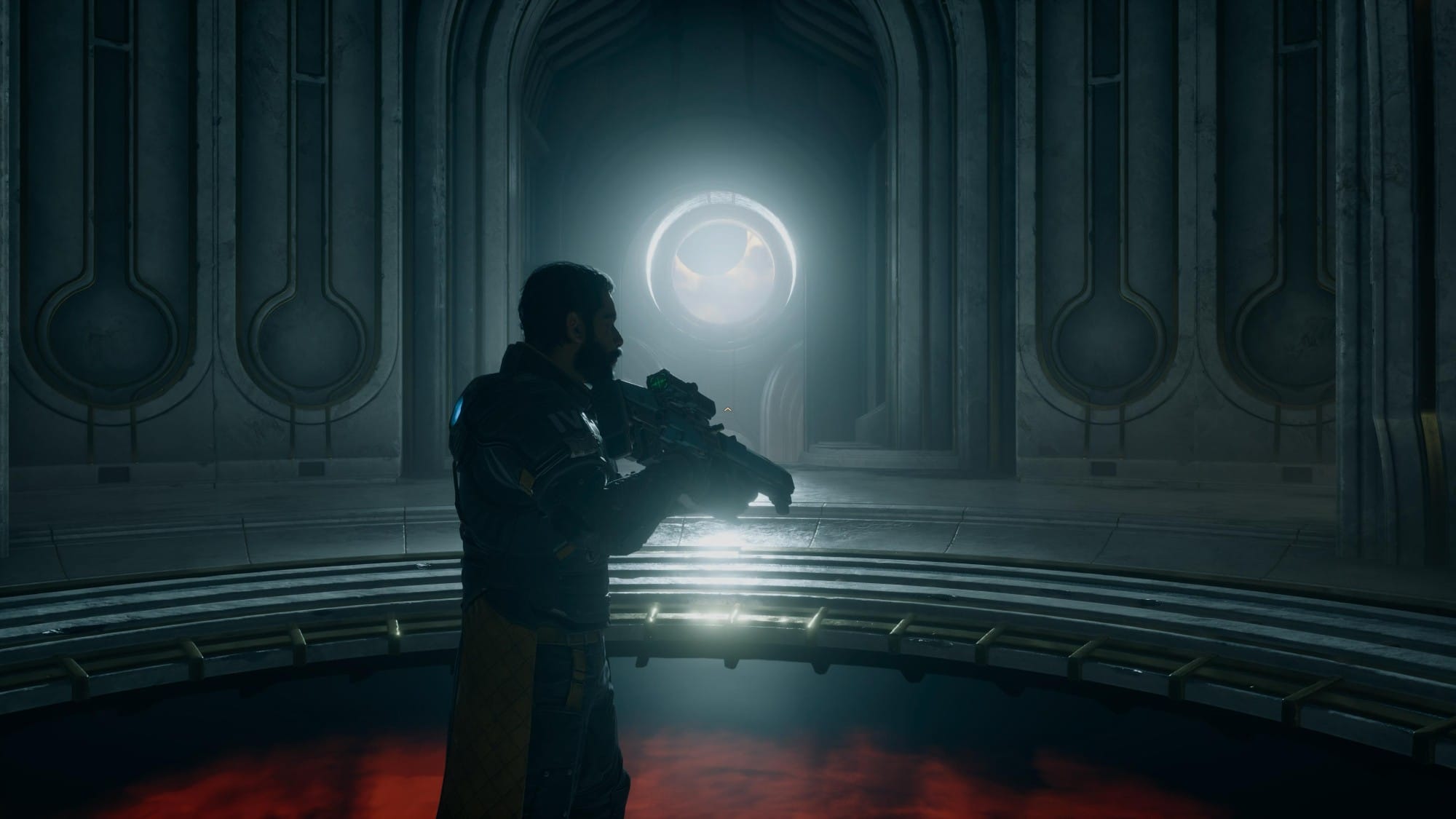 Armored man with a rifle stands in a dim sci-fi corridor as a glowing circular portal lights the background.